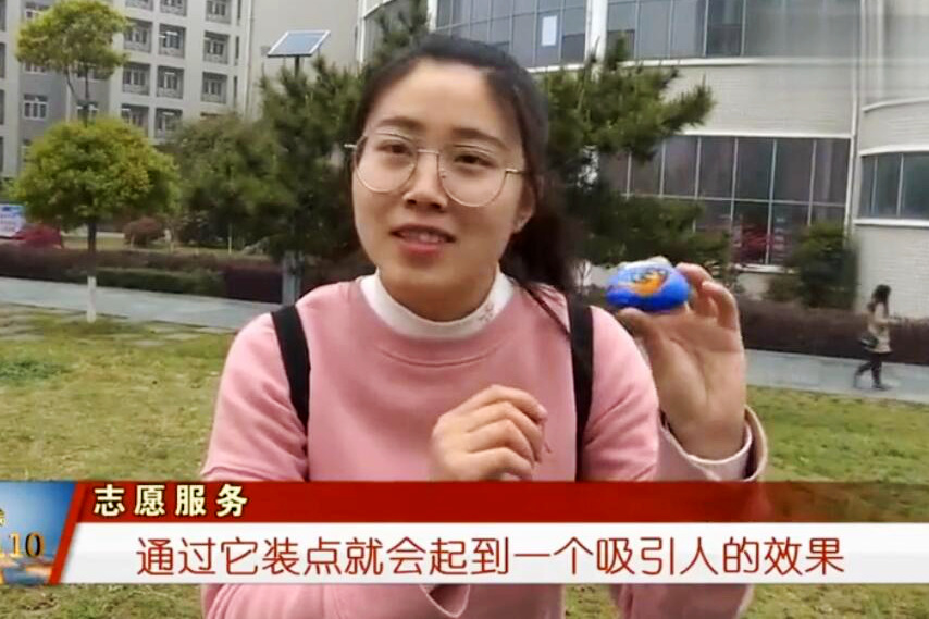 开云手机官网入口：彩绘石头吸引眼球，爱心志愿者助山区孩子